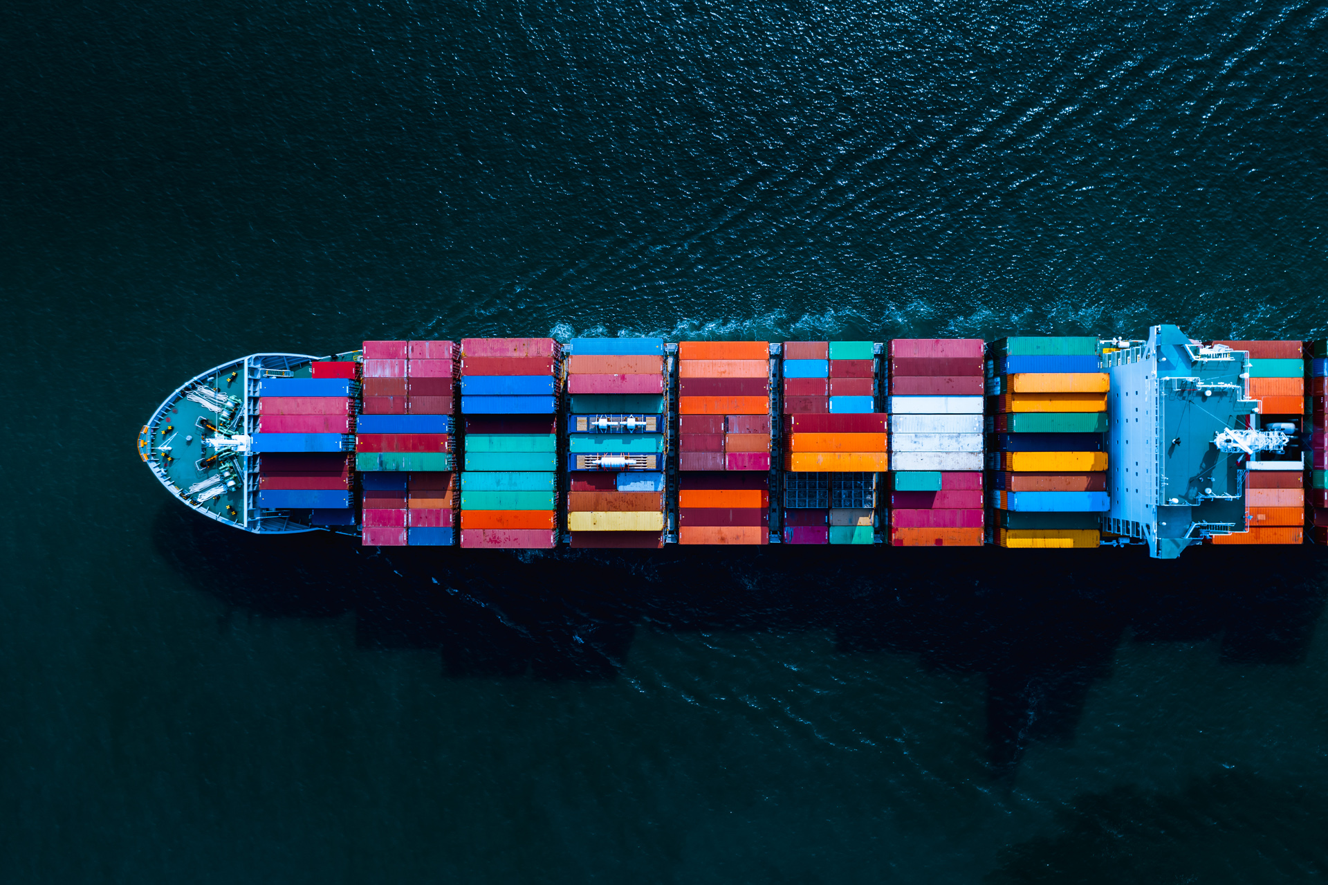 shipping cargo container transportation business services import and export international on the sea flight aerial view
